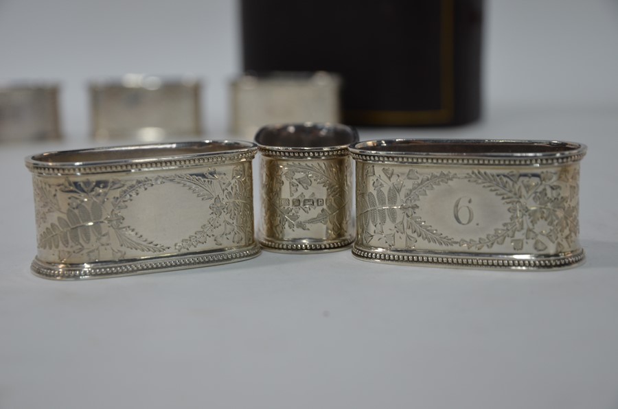 A Victorian cased set of six foliate-engraved silver napkin rings - Image 3 of 3