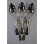 Three George III silver fiddle pattern table spoons and pair of dessert spoons