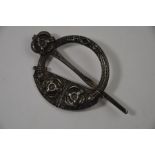 A Scottish style white metal cloak brooch