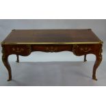 A French gilt-metal mounted kingwood, bois satinee and burr amboyna bureau plat of Louis XV style