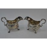A good pair of George III silver pot-bellied sauce boats