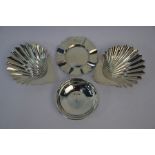 A pair of late Victorian silver shell nut-dishes, silver bowl and ashtray