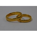 Two 22ct yellow gold wedding bands