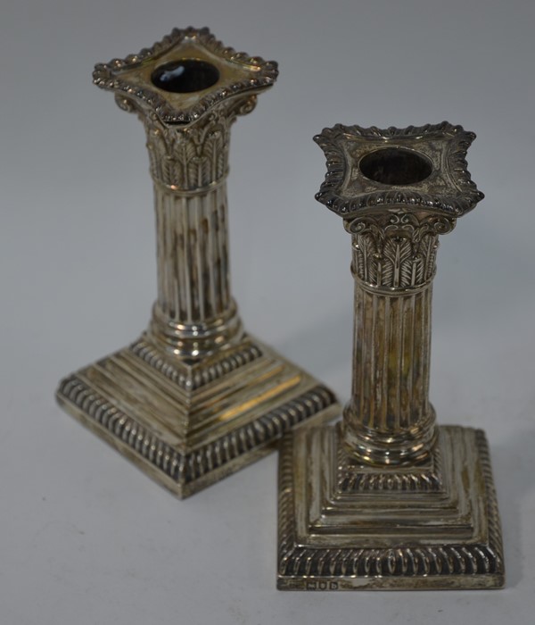 A pair of late Victorian loaded silver classical column candlesticks - Image 2 of 4