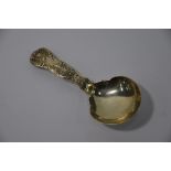 A Victorian cast silver Kings pattern caddy spoon