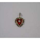 WITHDRAWN An enamel, diamond and pearl heart shaped locket