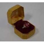 An Art Deco style ruby and diamond ring