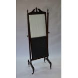 An Edwardian red walnut framed cheval mirror