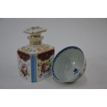 An 18th century Worcester blue and white bowl and French porcelain eau de cologne bottle