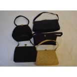 A collection of 1940s black corded handbags and other evening bags and scarves