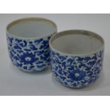 A pair of Chinese blue and white lotus scroll jars, Kangxi period, 10.5 cm high