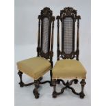 A pair of 17th century style Italian walnut high back side chairs