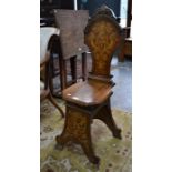 A 19th century Dutch marquetry hall chair