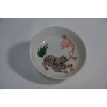 A small Chinese lion and brocade ball ball dish, Guangxu mark