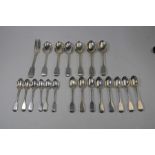 A mixed set of six Victorian silver dessert spoons etc.