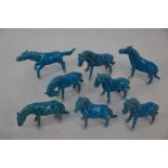 A group of eight Chinese 20th century turquoise glazed models of the eight horses of Wang Mu