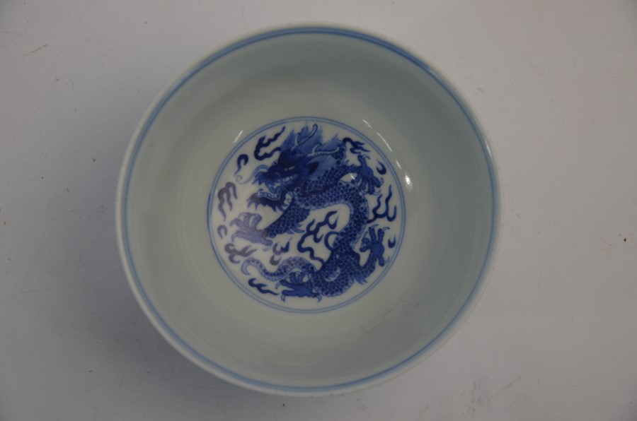 A Chinese blue and white 'Dragon' bowl with Kangxi six-character mark - Image 3 of 10