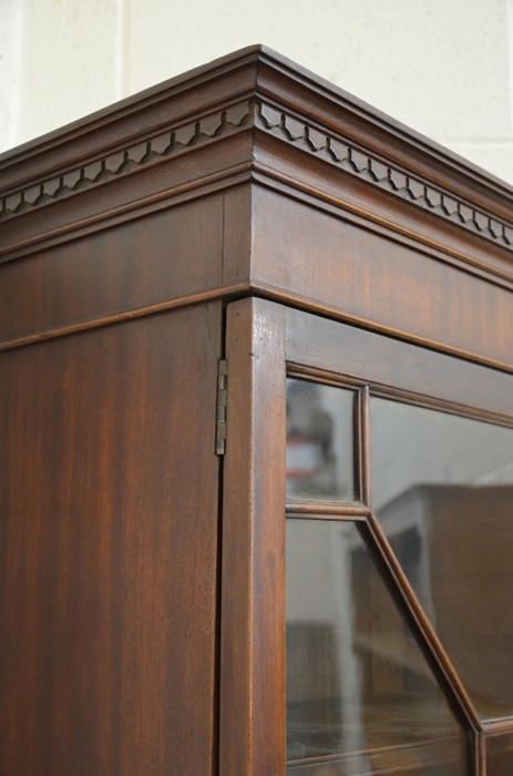 An Edwardian mahogany bookcase cabinet with astragal glazed door enclosing three shelves over a - Image 3 of 5