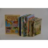 11 Rubert Bear Daily Express Annuals in worn condition to/w 7 other children's books