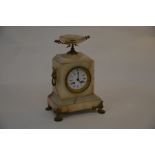 A Neo-classical style French mantle clock, the case with brass mounts on marble base, signed