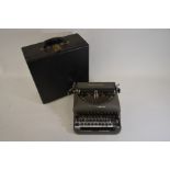 A cased Remington Rand office typewriter