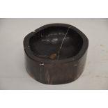 A large black and white marble mortar/bowl, 37.5 cm diam