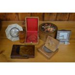 A collection of wooden pocket watch stands/boxes to/w treen pick holder, floral decorated stud box