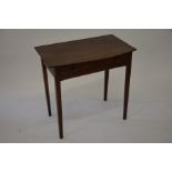 A 19th century mahogany bowfront hall table with single frieze drawer raised on tapering square