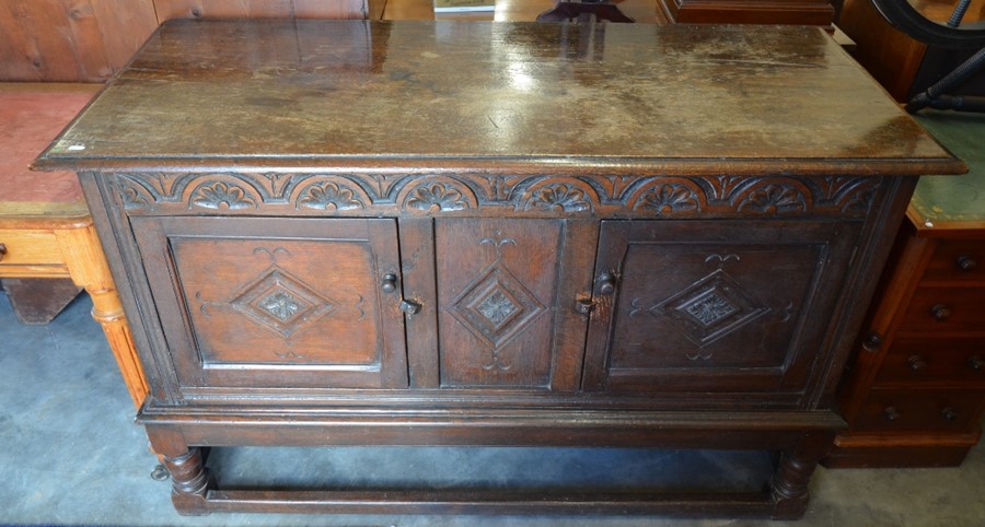 A 19th century lunette carved oak sideboard with panelled doors, turned supports and stretchers, - Image 3 of 4