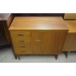 A teak sewing table with Singer Panoramic 650G sewing machine, automatic buttonhole and other