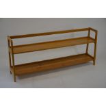 A wide light oak open bookcase with two shelves, 160 cm wide