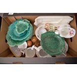 A box of 19th century and later decorative ceramics including 15 Wedgwood majolica green glazed