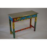 A fabric-covered console table, the lacquered silvered top above a long frieze drawer, 100 cm