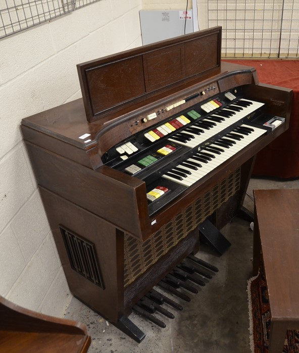 A Hammond electric organ and stool a/f not testedNo sound, fires up, button/tabs broken