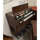 A Hammond electric organ and stool a/f not testedNo sound, fires up, button/tabs broken