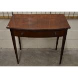 A 19th century mahogany bow front hall table with single frieze drawer, raised on slender tapering