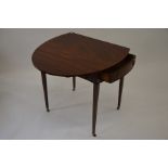 A 19th century mahogany Pembroke table with crossbanded drop leaf top, end drawer opposed by dummy