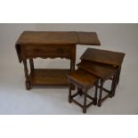 Oak drop leaf side table with carved frieze drawer to/w an old charm nest of three oak tables (2)