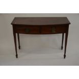 A 19th century mahogany bowfropnt hall table with two drawers, 110 cm wide