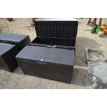 Two Keter faux wood storage trunks