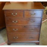 A small mahogany chest of two short over three long drawers raised on bracket feet, 91 cm high x