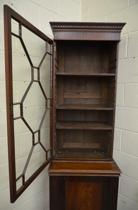 An Edwardian mahogany bookcase cabinet with astragal glazed door enclosing three shelves over a - Image 5 of 5