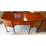 A Georgian mahogany bowfront sideboard