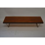 A contemporary teak rectangular coffee table on metal supports to/w matching smaller example (2)