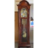 A modern Bulova mahogany longcase clock with domed top,  bevelled glass panels and fluted columns,