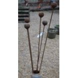 A set of five steel ball flowerhead garden plant supports