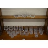 A selection of good quality cut glass tumblers and brandy  balloons, including Stuart, Webb and