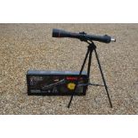 A Tasco space station telescope on tripod (boxed)