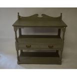 An Edwardian grey painted three-tier buffet with two drawers and turned column supports