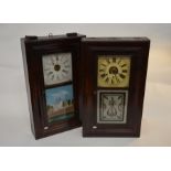 Two American ogee wall clocks, in mahogany cases with decorative glass panels, one with triple train